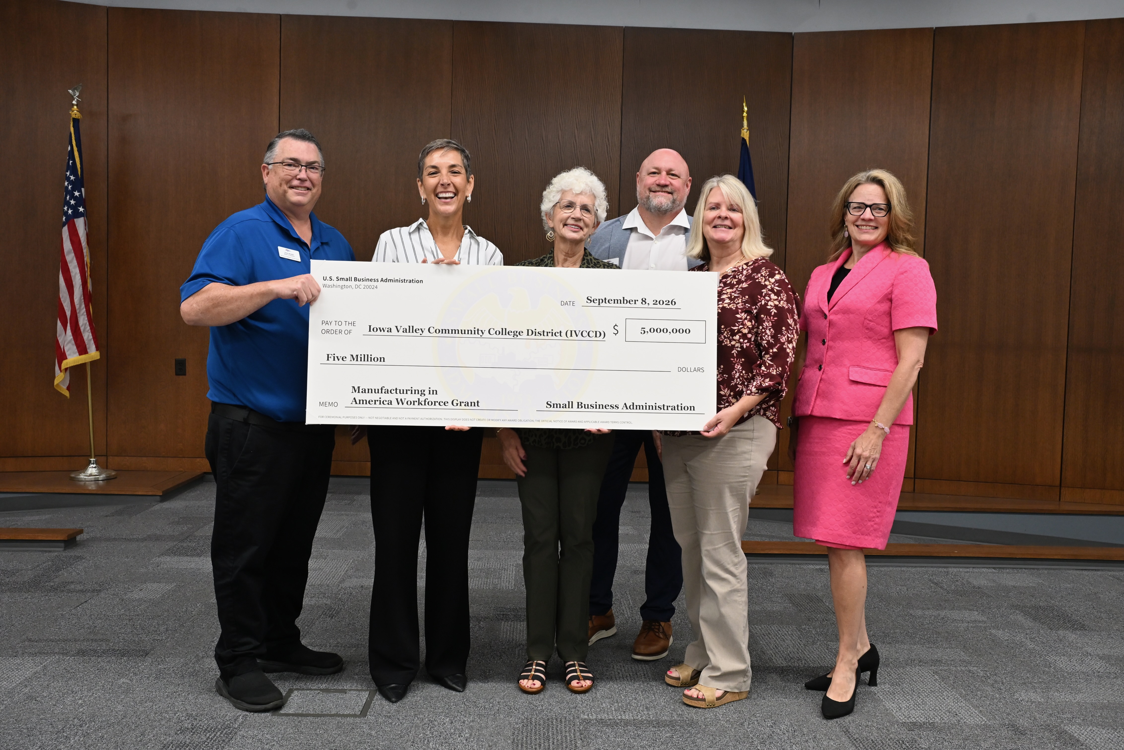 Iowa Valley Community College District and U.S. Small Business Administration officials mark the presentation of a $5 million manufacturing training grant.