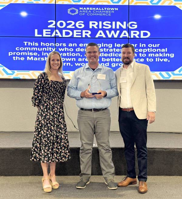 Pete Drury receiving the Rising Leader Award at the Chamber Banquet. Pictured from left to right Development Director Kate Bowermaster, Pete Drury, and Chamber Board Chair Zach Stahlin.