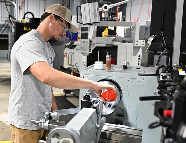 Machine Tool Technology machine-tool-student-working-on-equipment