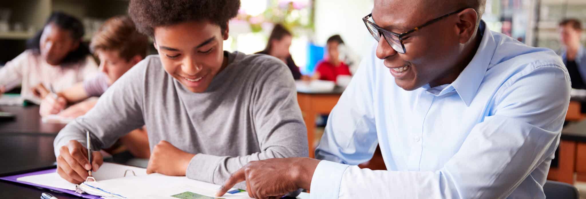 Student with teacher studying